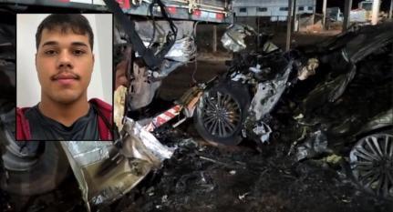 Carro bate na traseira de bitrem, motorista fica preso às ferragens e morre carbonizado.